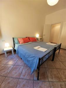 Posteľ alebo postele v izbe v ubytovaní Bologna Apartment