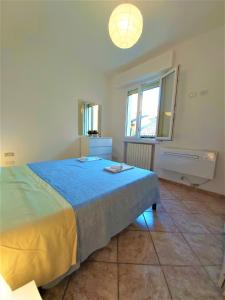 Posteľ alebo postele v izbe v ubytovaní Bologna Apartment