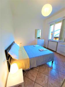Posteľ alebo postele v izbe v ubytovaní Bologna Apartment