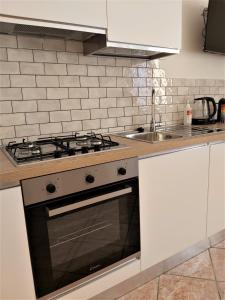 Kuchyňa alebo kuchynka v ubytovaní Bologna Apartment