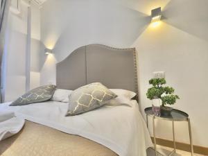 Posteľ alebo postele v izbe v ubytovaní Vitti's Home Verona 3