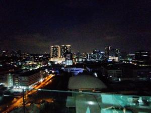 a view of a city at night with lights at 1 bed room service apartment for 3 guests in Petaling Jaya
