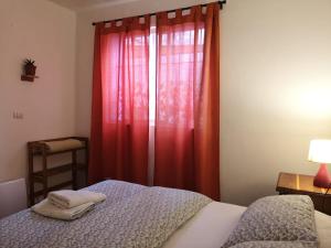Cama ou camas em um quarto em Hostal Vitalia