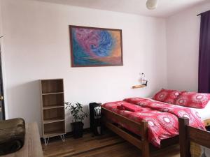 Cama ou camas em um quarto em Hostal Vitalia