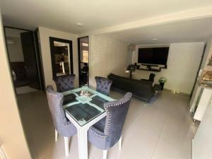 TV a/nebo společenská místnost v ubytování Espectacular apartamento totalmente amoblado