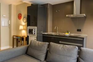 Kuchyňa alebo kuchynka v ubytovaní AB Apartamentos Museum