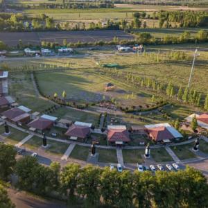 an aerial view of a park with buildings and cars at UCOGUESTHOUSE - Casa de Huéspedes in Vista Flores