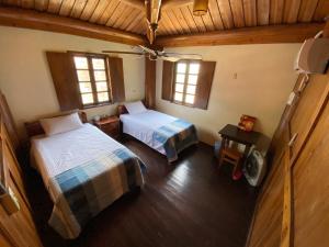 Postel nebo postele na pokoji v ubytování Jin Sha Ting Hai Homestay I