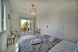 Posteľ alebo postele v izbe v ubytovaní IMMOGROOM - Fully equipped - Terrace with sea view - AC
