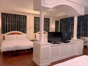 Μια τηλεόραση ή/και κέντρο ψυχαγωγίας στο Traveler Hotel Taitung