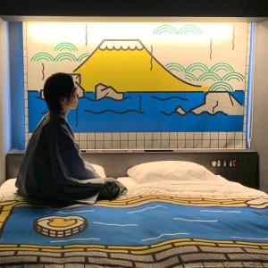 Postel nebo postele na pokoji v ubytování HOTEL TAVINOS Kyoto