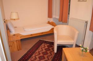 Postel nebo postele na pokoji v ubytování Hotel Pension Walzerstadt