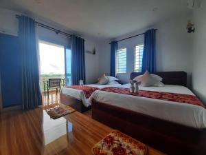 Postel nebo postele na pokoji v ubytování Realkhom Villa + 10 fotografií