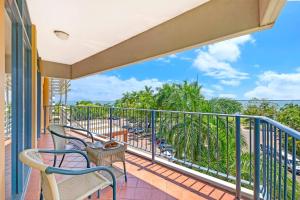 Balkon ili terasa u objektu Breezy Harbourfront Resort Escape with Tropical Pool