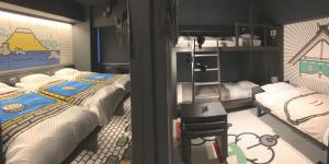 Postel nebo postele na pokoji v ubytování HOTEL TAVINOS Kyoto