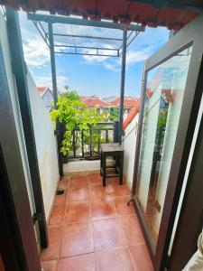 Balkón nebo terasa v ubytování Ngo House Villa