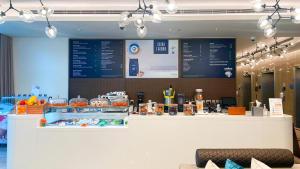 a counter in a restaurant with a counter top at Wyndham Dubai Deira in Dubai