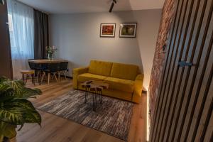 Posedenie v ubytovaní Bison Apartamenty