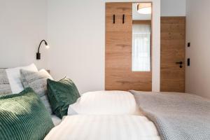 Posteľ alebo postele v izbe v ubytovaní Hohe Tauern Lofts Panoramabahn by Alpina-Holiday