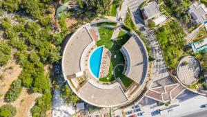 an overhead view of a circular building with a pool at Duja Bodrum in Torba