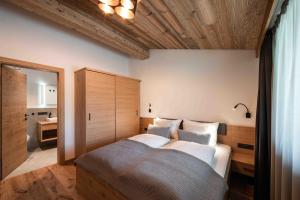 Posteľ alebo postele v izbe v ubytovaní Hohe Tauern Lofts Panoramabahn by Alpina-Holiday