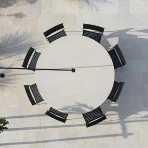 a large clock on the side of a wall at Villa CREA in Marina di Leuca