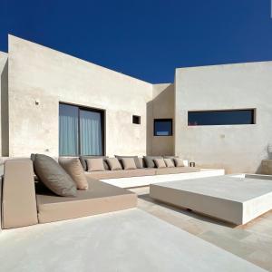 a living room with couches and a couch at Villa CREA in Marina di Leuca
