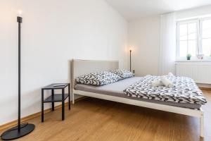 Postel nebo postele na pokoji v ubytování Prázdninový dům pod vinicí