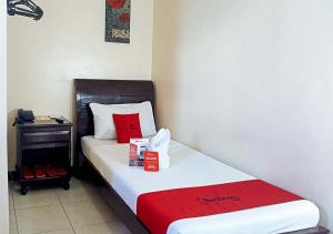 Letto o letti in una camera di RedDoorz Near Ormoc Port Terminal