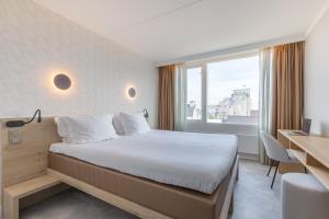 Postel nebo postele na pokoji v ubytování Hotel de Baak Seaside