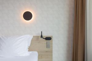 Postel nebo postele na pokoji v ubytování Hotel de Baak Seaside