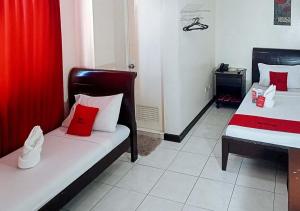 Letto o letti in una camera di RedDoorz Near Ormoc Port Terminal