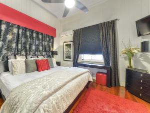 A bed or beds in a room at One Thornbury