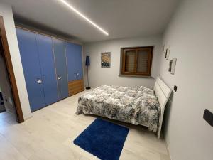 Posteľ alebo postele v izbe v ubytovaní profumo di legno