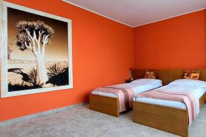 Posteľ alebo postele v izbe v ubytovaní Afrika Hotel Frýdek-Místek