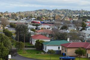 a small town with houses and a street at Blue Lake Motel in Mount Gambier