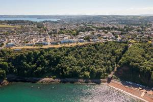 an aerial view of a city and a body of water at Cozy, Chic, Dairy Cottage near to Beach & Shops- Parking in Torquay