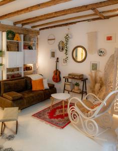 a living room with a couch and a table at Rosalia Apartment in Koper