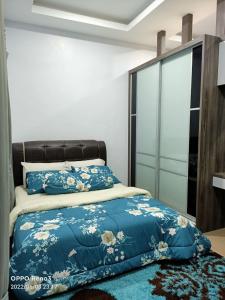 Voodi või voodid majutusasutuse Tambun Hillview Cottage 1 toas