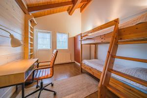 Postel nebo postele na pokoji v ubytování Levillas Golfväylä 3C