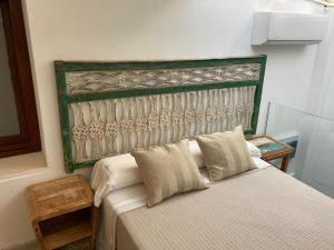 Łóżko lub łóżka w pokoju w obiekcie Room Tarifa