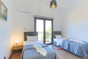 Ένα ή περισσότερα κρεβάτια σε δωμάτιο στο Villa Salina +48 φωτογραφίες