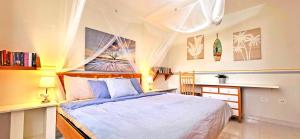 Postel nebo postele na pokoji v ubytování CASA LA ISLA - Tarajalejo - GlasfaserInternet - Garten