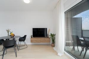 TV a/nebo společenská místnost v ubytování Apartman Ivan Krk