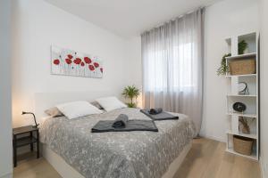 Postel nebo postele na pokoji v ubytování Apartman Ivan Krk