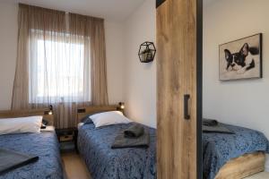 Postel nebo postele na pokoji v ubytování Apartman Ivan Krk