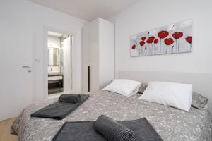 Postel nebo postele na pokoji v ubytování Apartman Ivan Krk