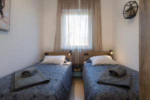 Postel nebo postele na pokoji v ubytování Apartman Ivan Krk