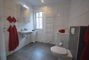 Koupelna v ubytování Ferienwohnung Up Hobarg 35523