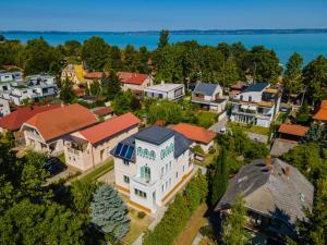 an aerial view of a small town with houses at Harmony Boutique Villa in Siófok